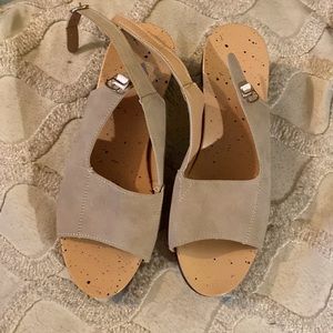 Generic, brand new small heeled sandals. LeAther top and cork-looking foot bed.